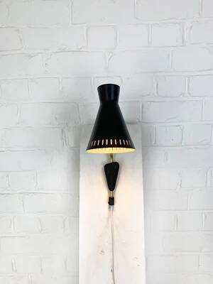 Scandinavian Diabolo wall light model 215 by EAE, Sweden, 1950s.