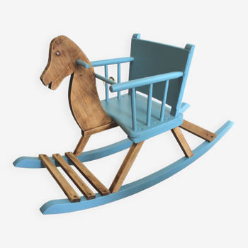 Blue and wooden rocking horse