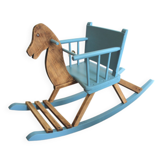 Blue and wooden rocking horse