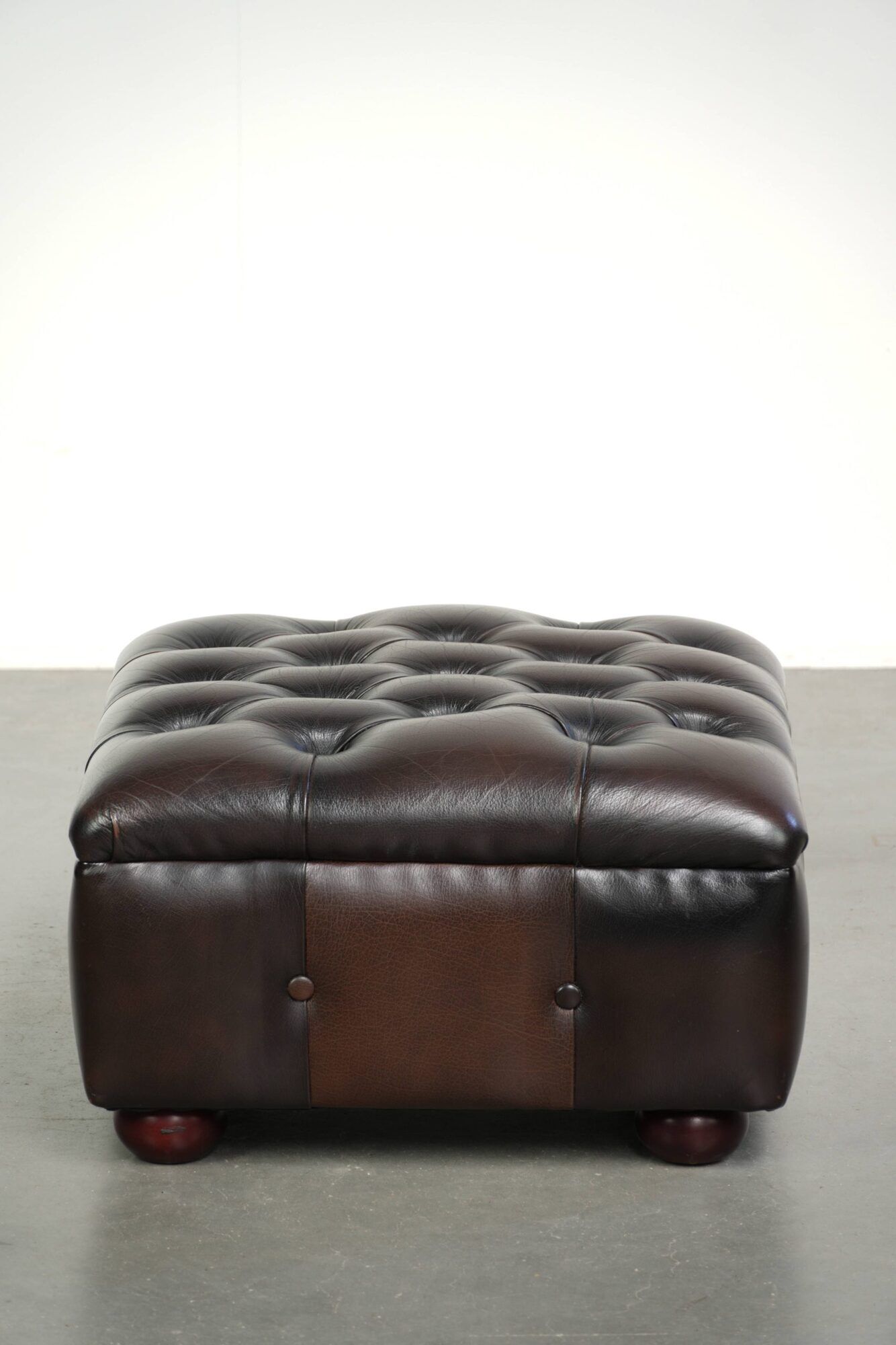 Cowhide Chesterfield ottoman with beautiful colours in English style