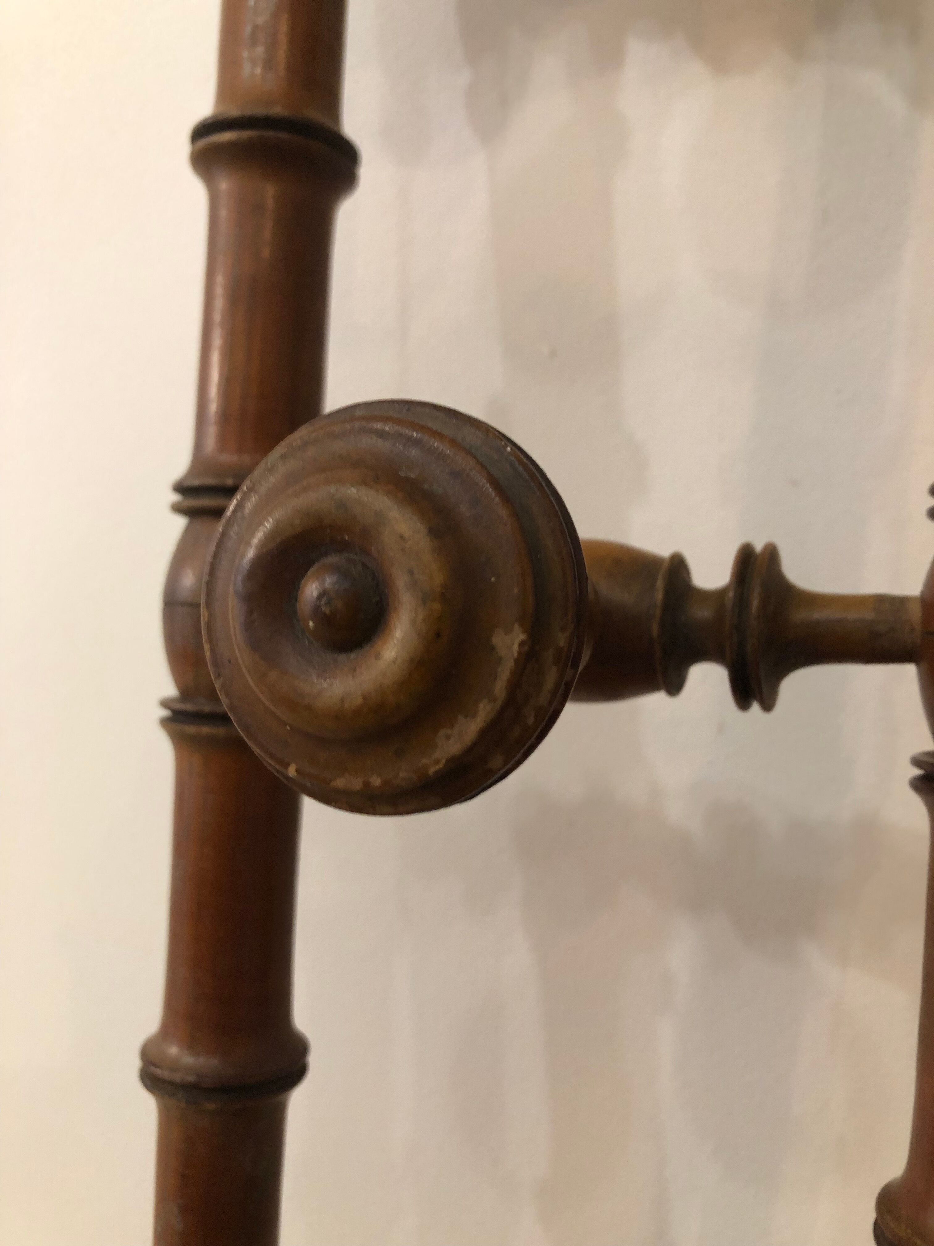 Wooden coat rack with swivel hooks