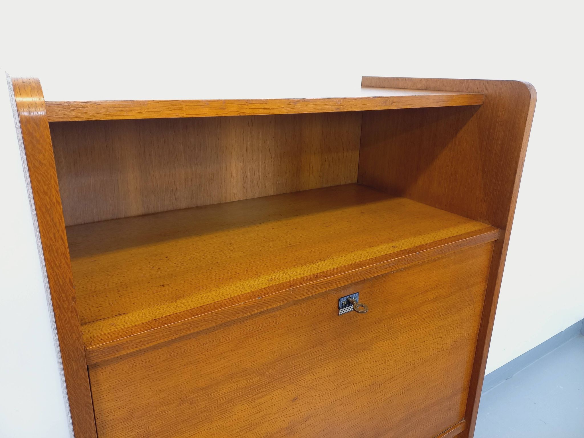 Vintage oak secretary storage furniture from the 1950s and 60s.