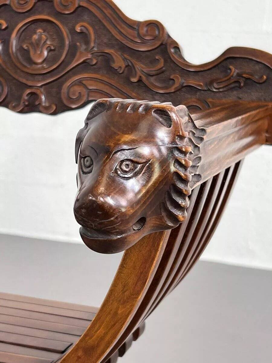 Vintage folding chair in carved wood