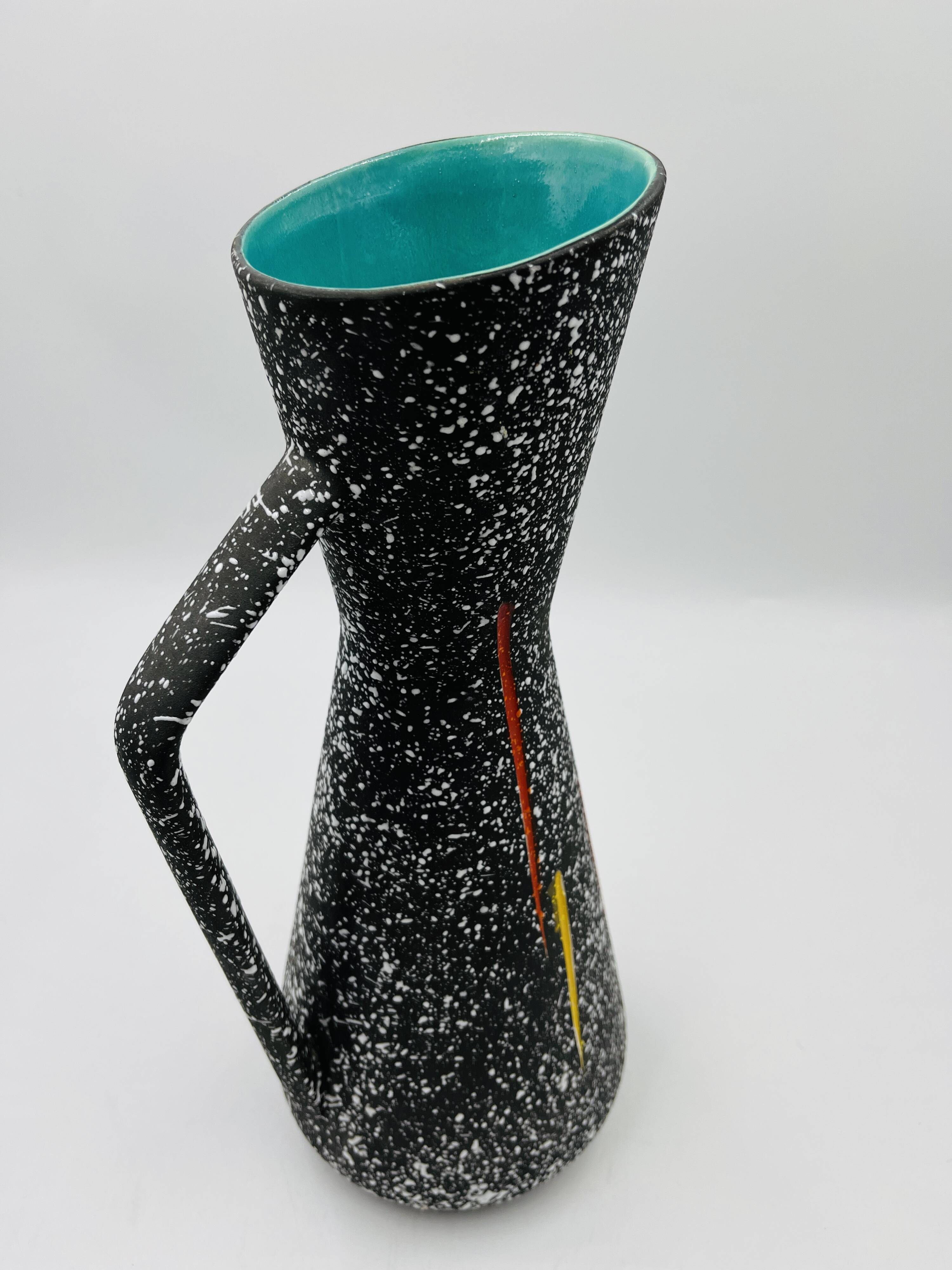 Vintage pitcher Hubert Bequet in speckled ceramic Belgium