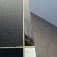 Designer coffee table in black lacquered wood and vintage brass