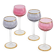Four colorful stemmed wine glasses