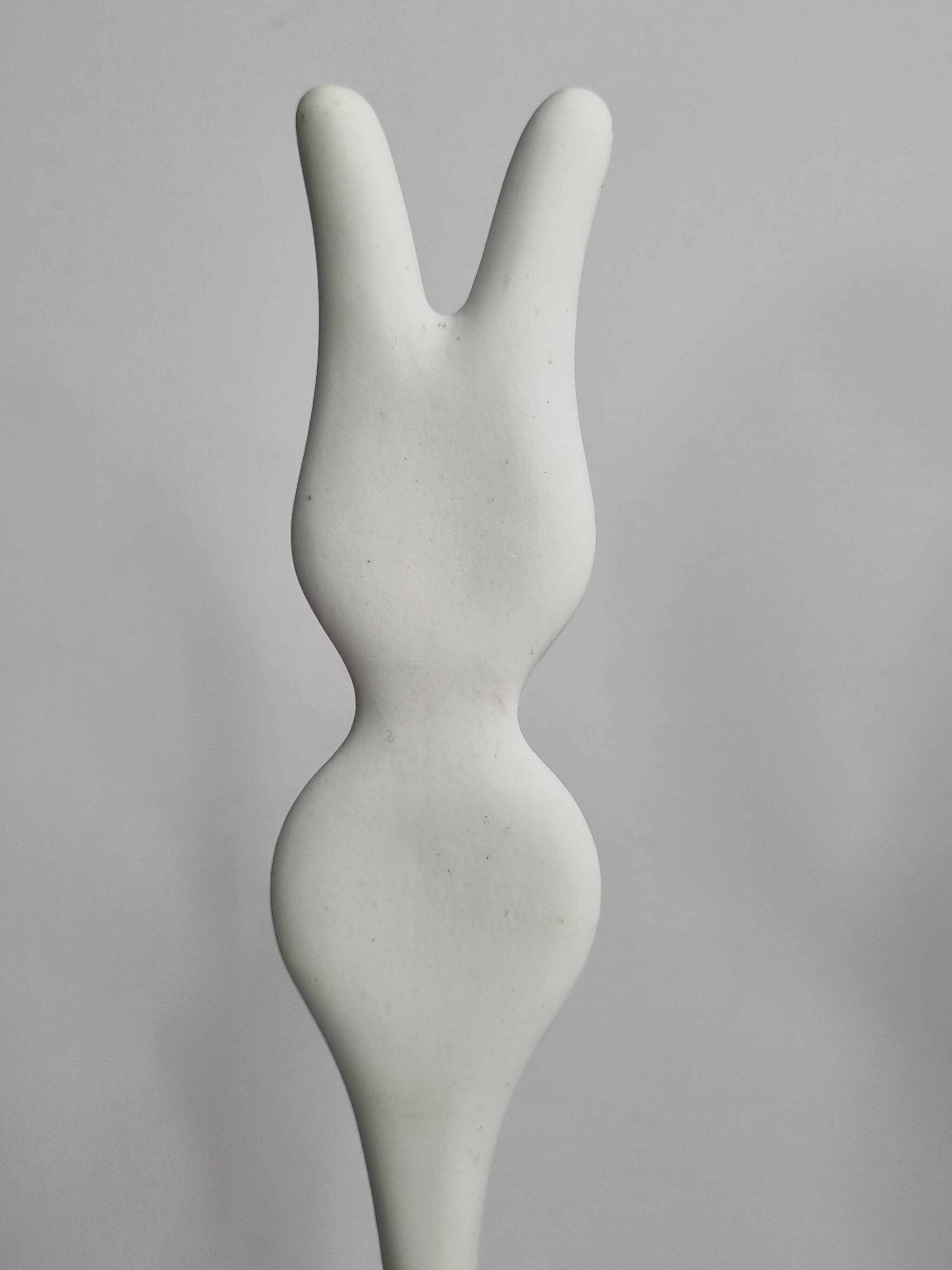 Biomorphic-inspired sculpture, on an industrial wooden base, 35 cm