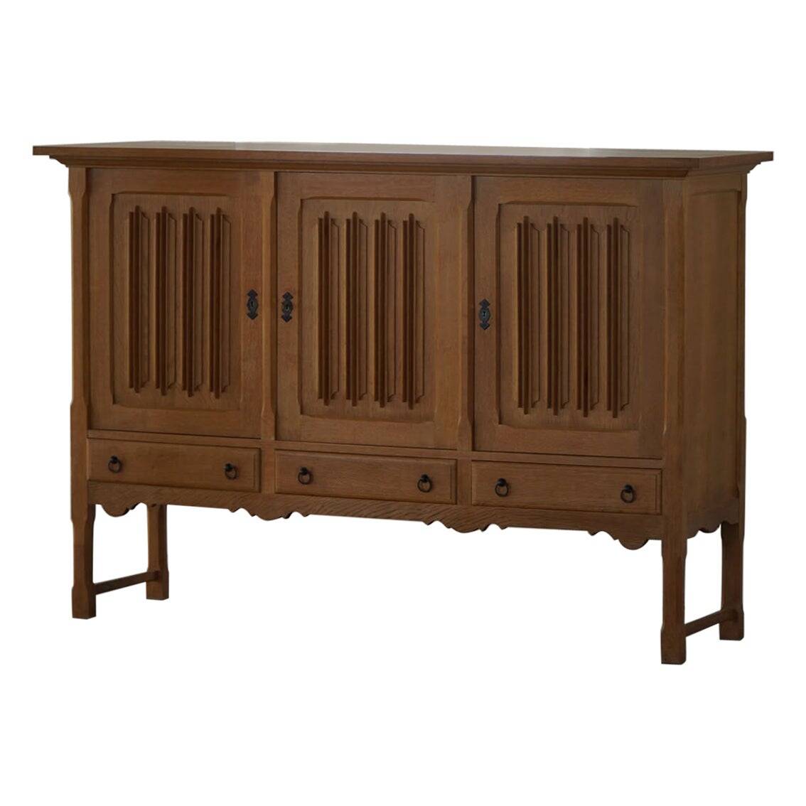 Brutalist oak sideboard, mid-century Danish design, Kjærnulf style, 1960s.