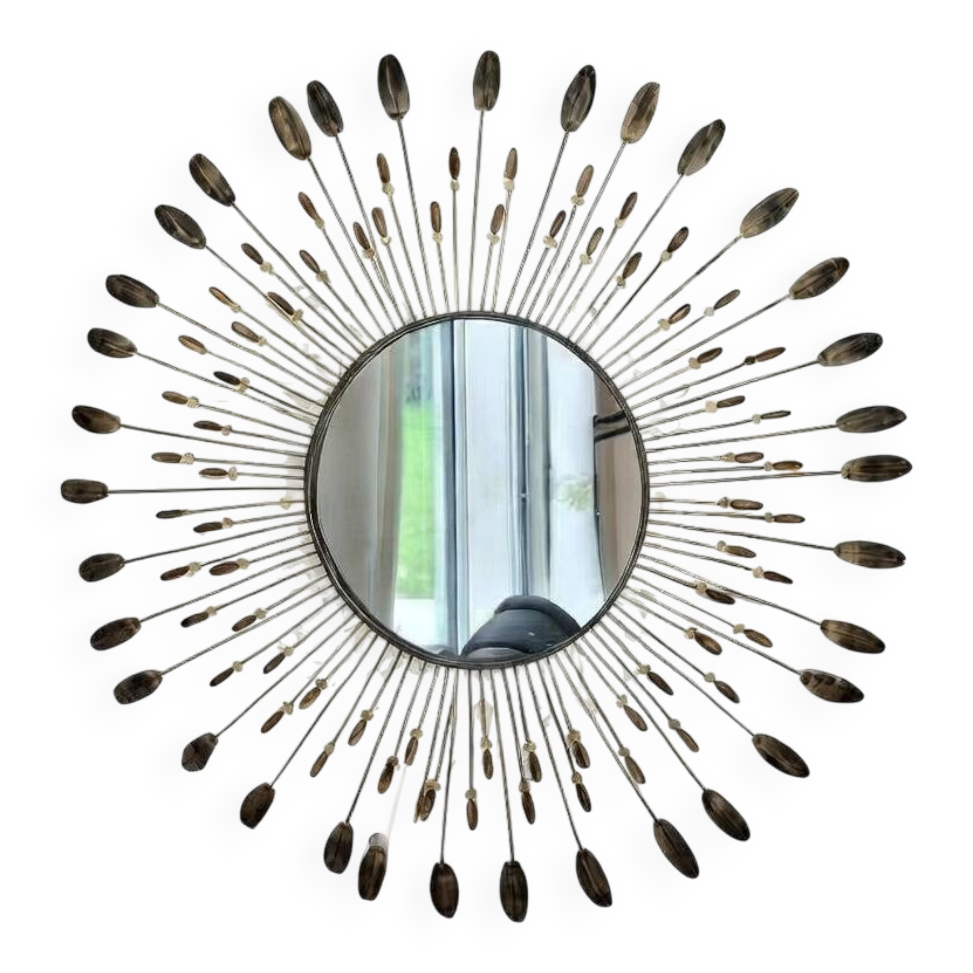 Vintage metal sun mirror in the style of Line Vautrin