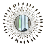 Vintage metal sun mirror in the style of Line Vautrin