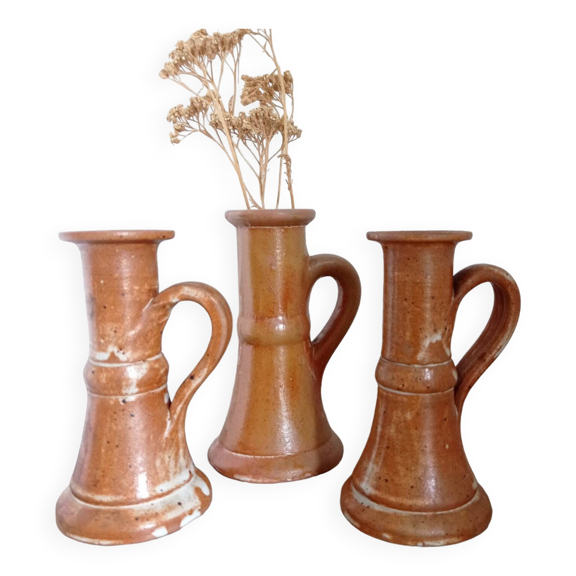 Enamelled stoneware candle holders