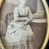 Pair of black wooden oval frames 1880’s  each 13 cm x 10 cm glass measurements 8.5 cm x 5.5 cm