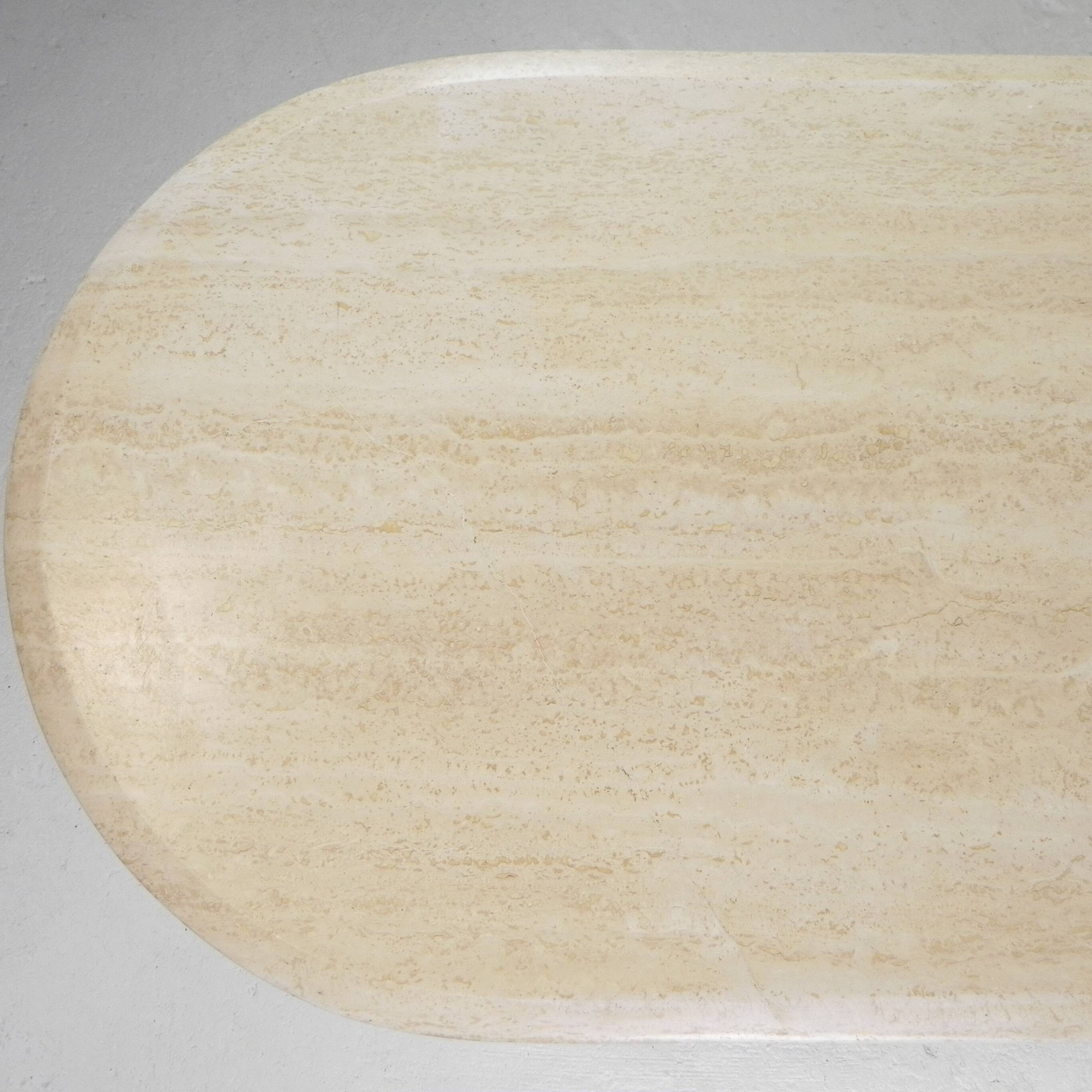 Mid-Century travertine coffee table with an oval top, 1970s.