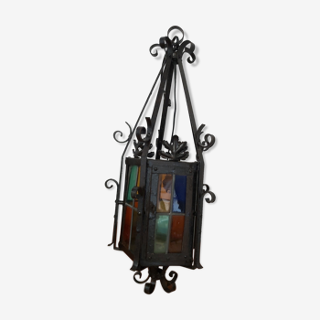Wrought iron lantern and stained glass windows