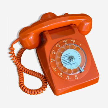 Téléphone à cadran vintage orange