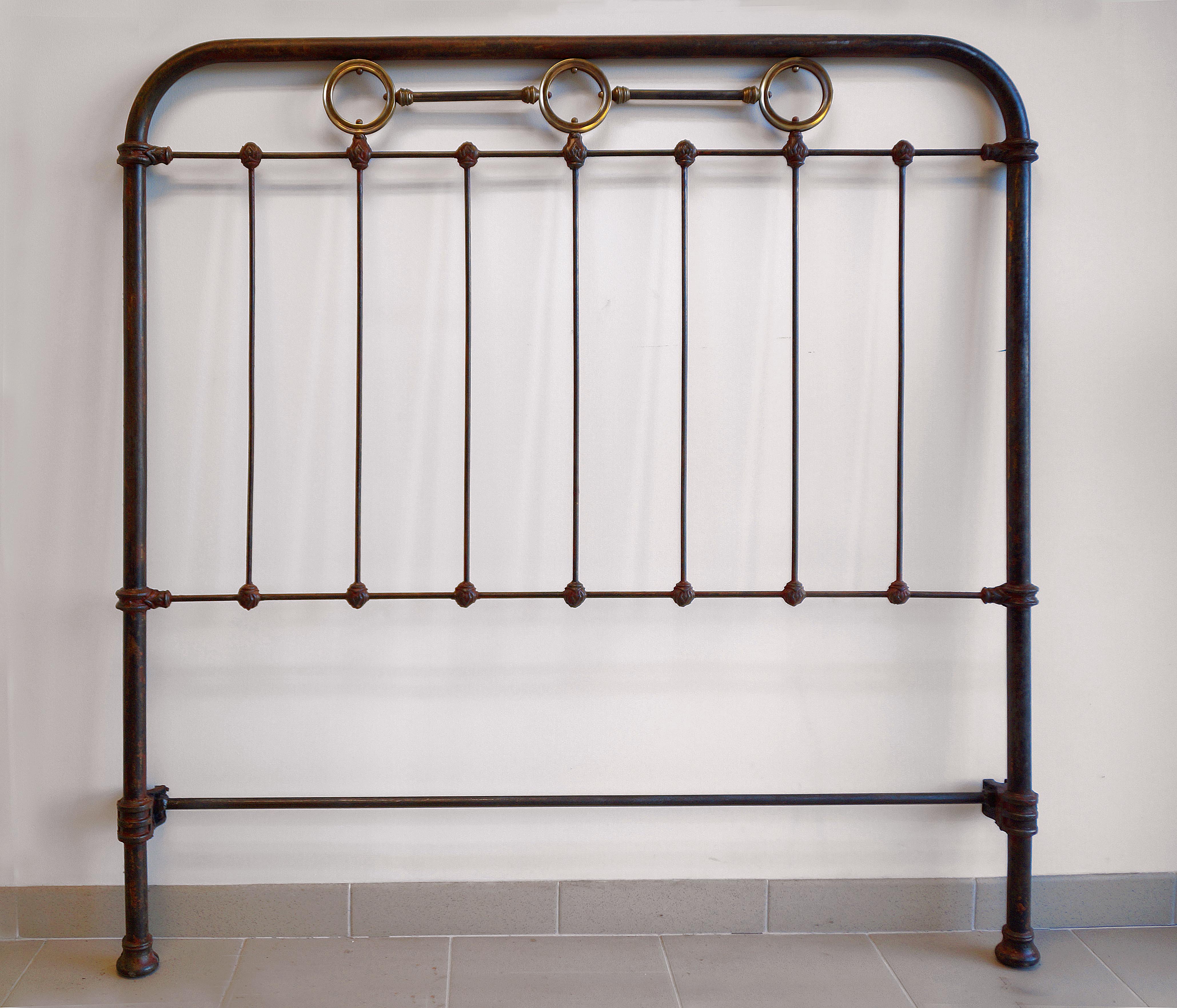 Iron and brass headboard
