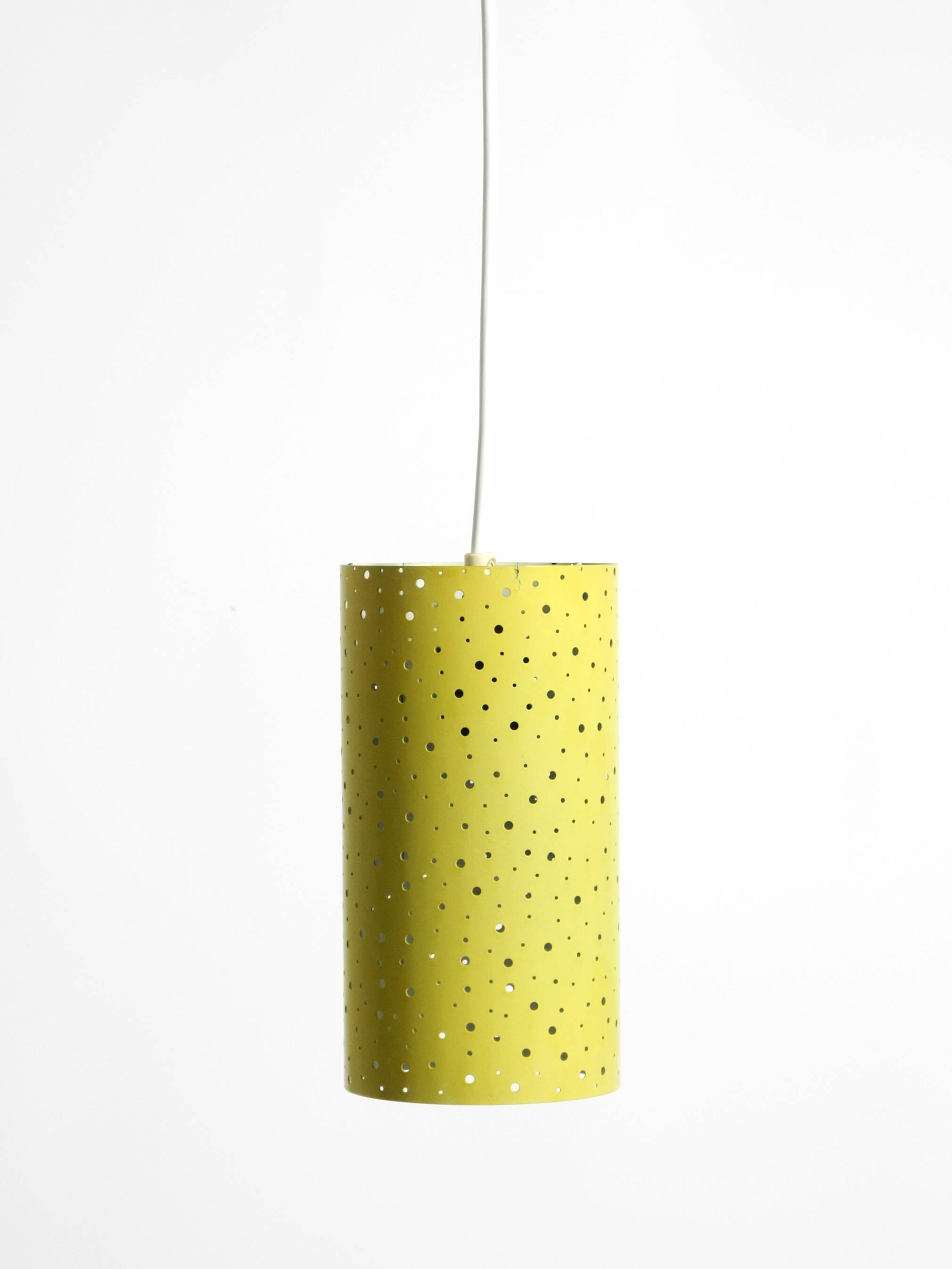 1950s pendant lamp in perforated metal, mustard yellow, by Ernest Igl