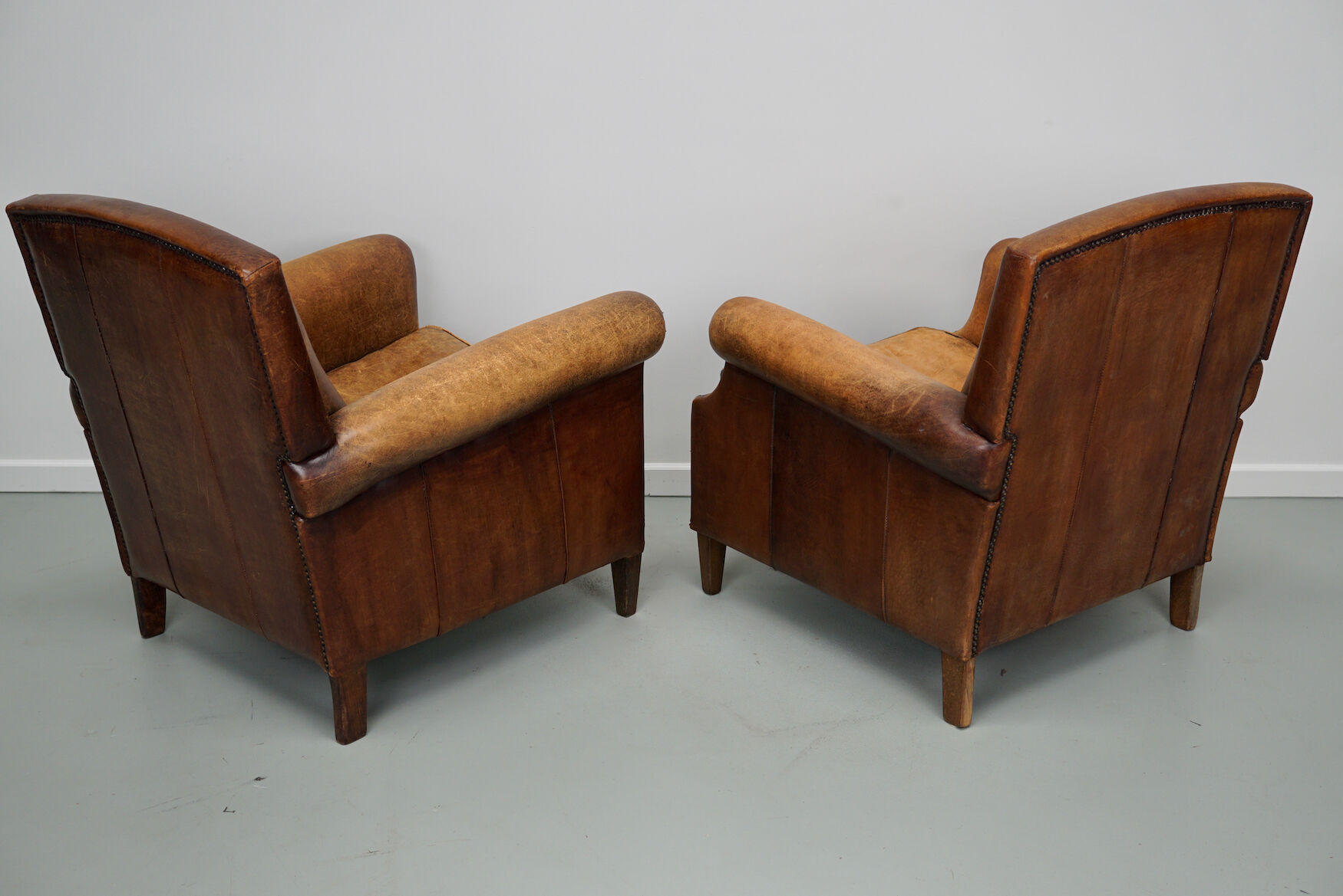 Vintage dutch cognac colored leather club chairs
