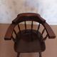 Armchair with wooden armrests