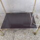Rolling serving table in brass