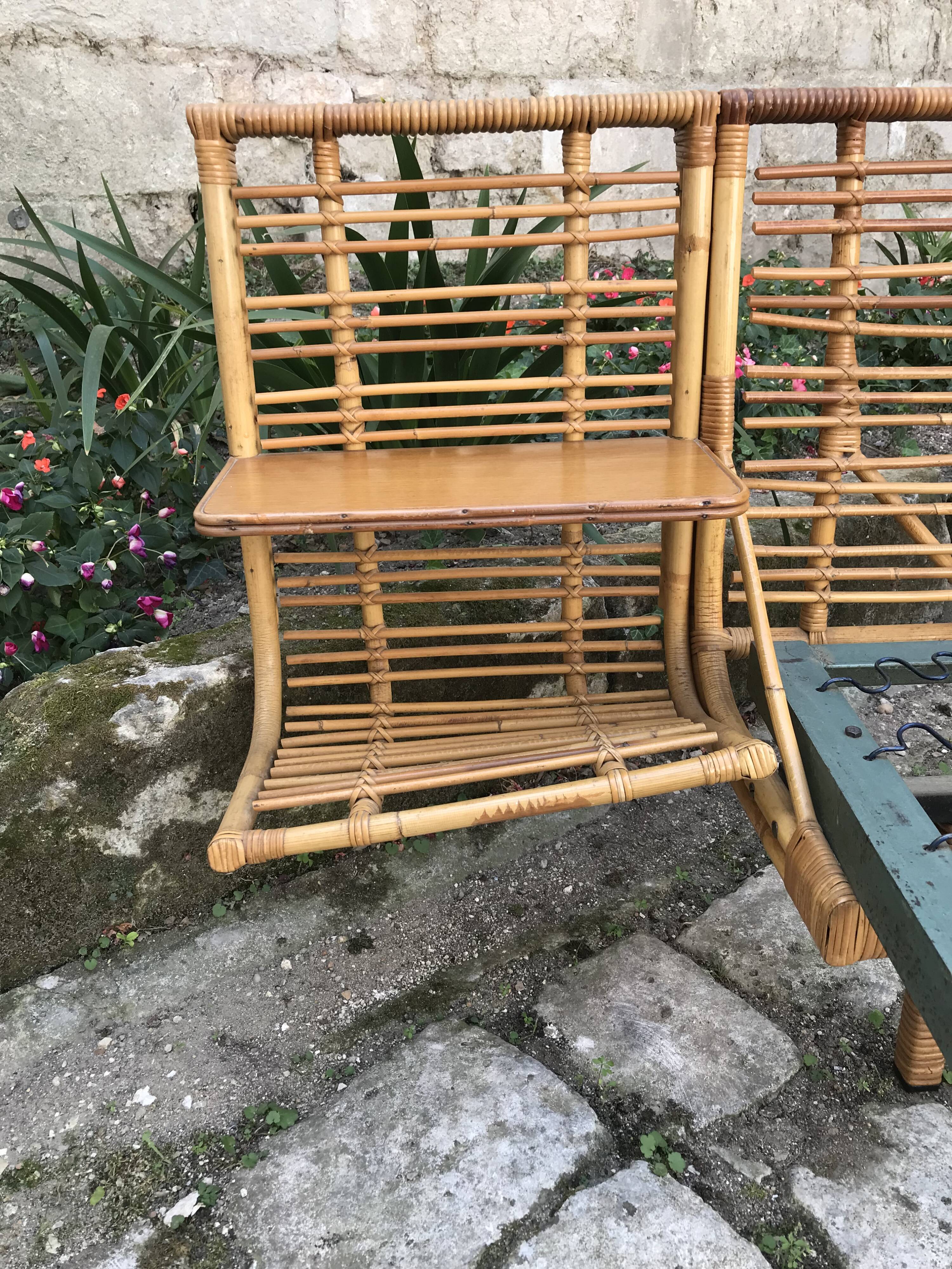 Twin rattan beds with built-in bedside tables