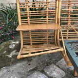 Twin rattan beds with built-in bedside tables
