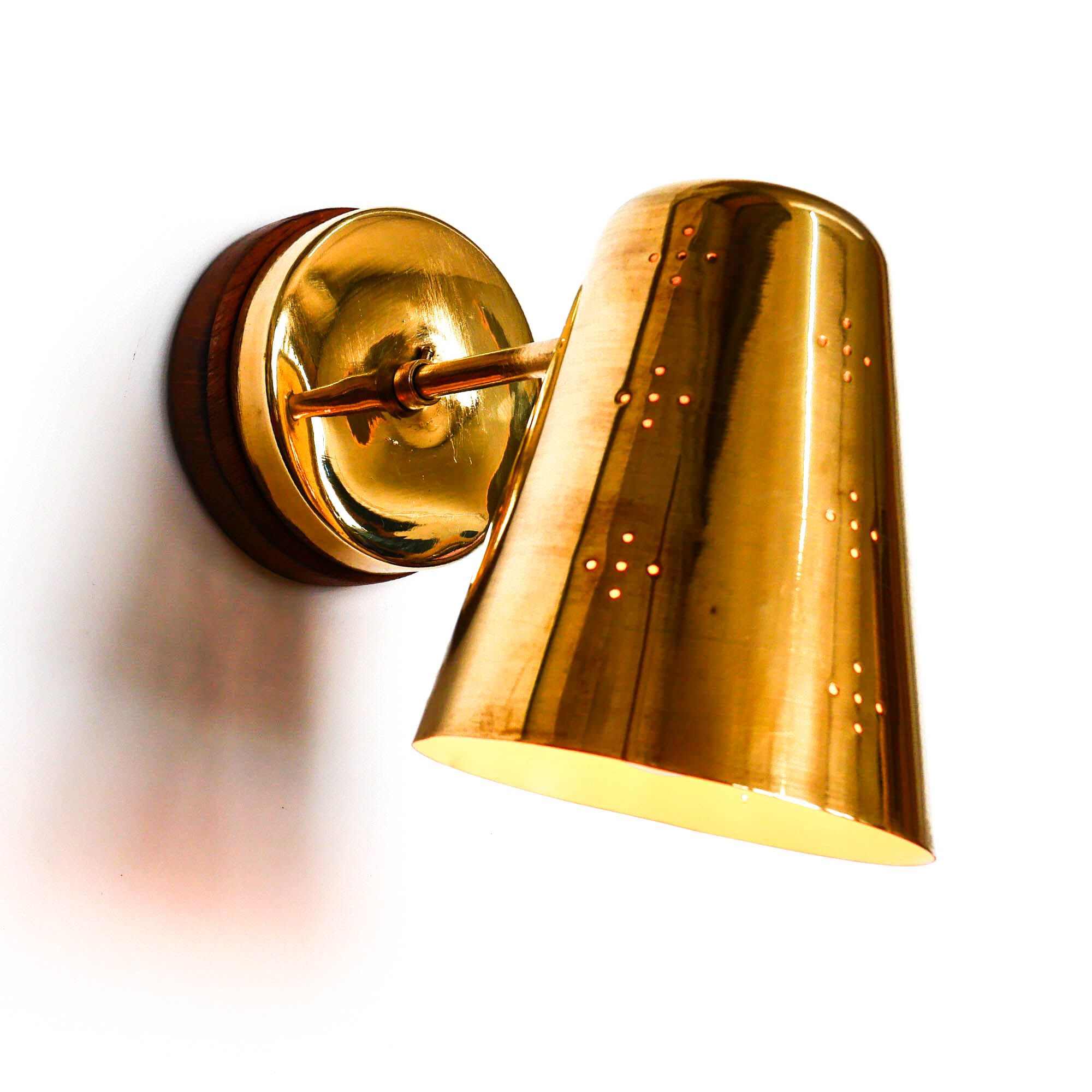 Old conical brass wall lamp, perforated lampshade