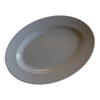 Very large oval opaque porcelain dish from Lunéville 1880-1900.