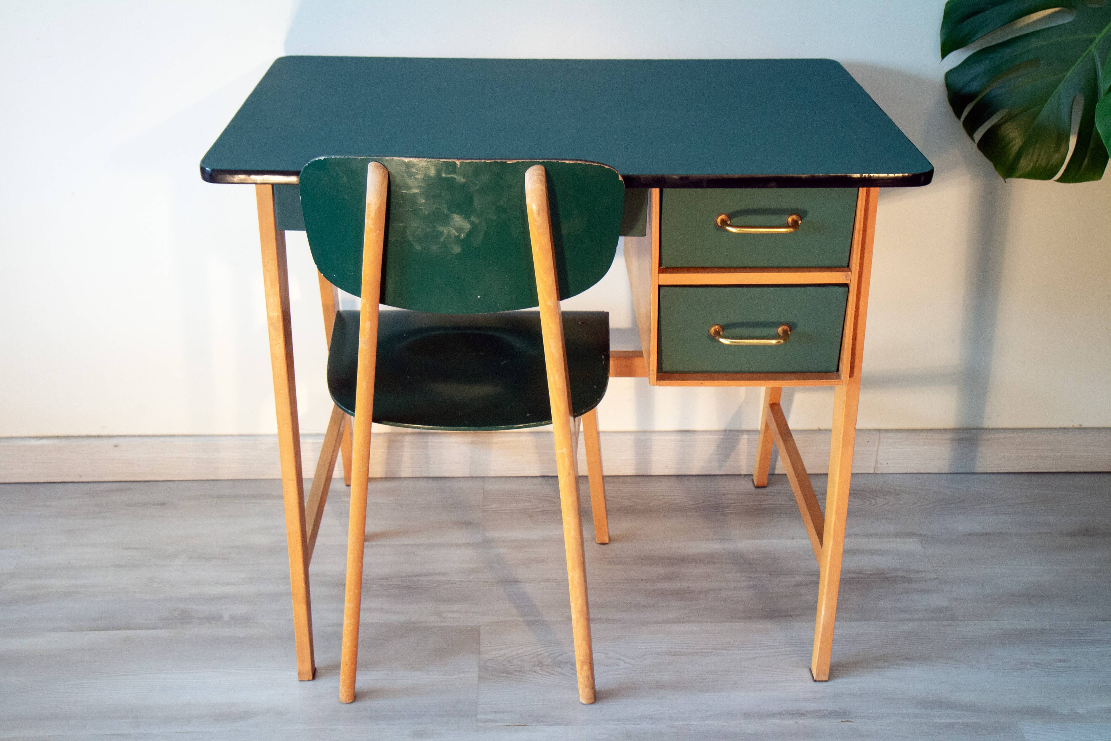 Desk and its green and wood chair, 1950s