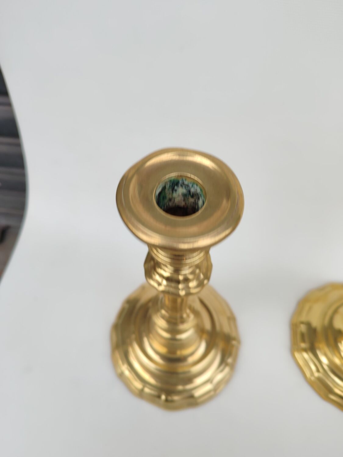 Pair of solid brass candlesticks, early 18th century.