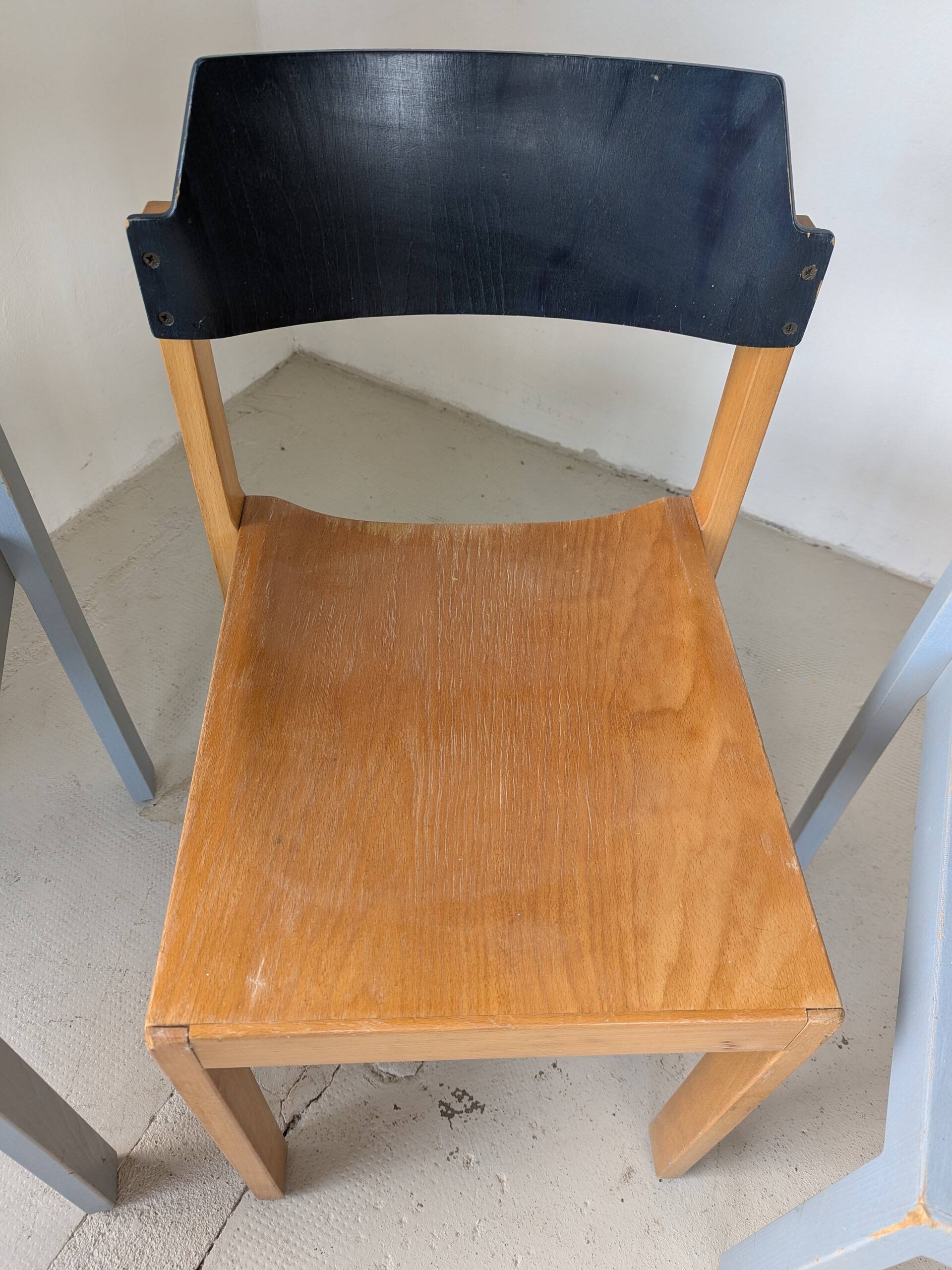 Set of 4 stackable chairs by Rainer Schell