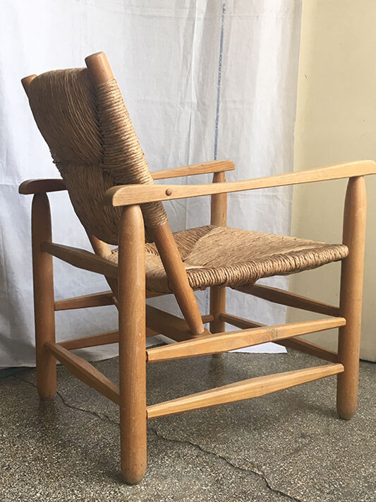 "Paillé" armchair by Charlotte Perriand