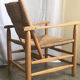 "Paillé" armchair by Charlotte Perriand
