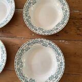Set of eight Moulin des loups soup plates