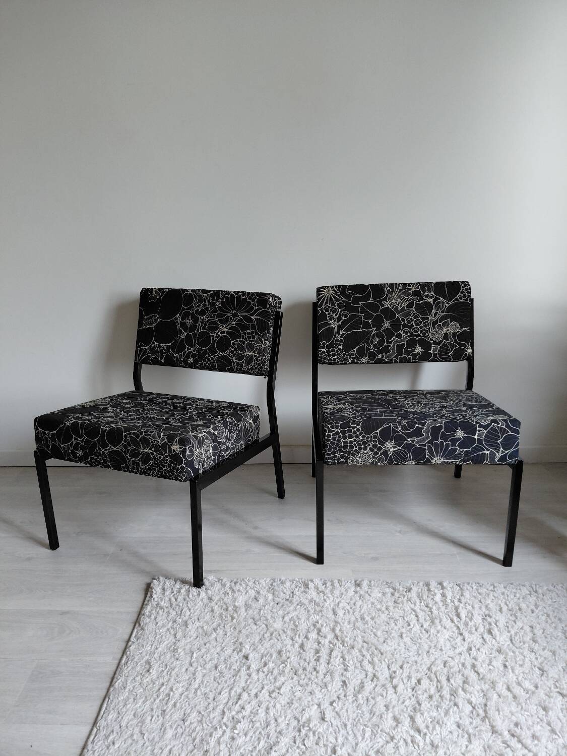 Pair of black metal and fabric armchairs, 1970s, restored.