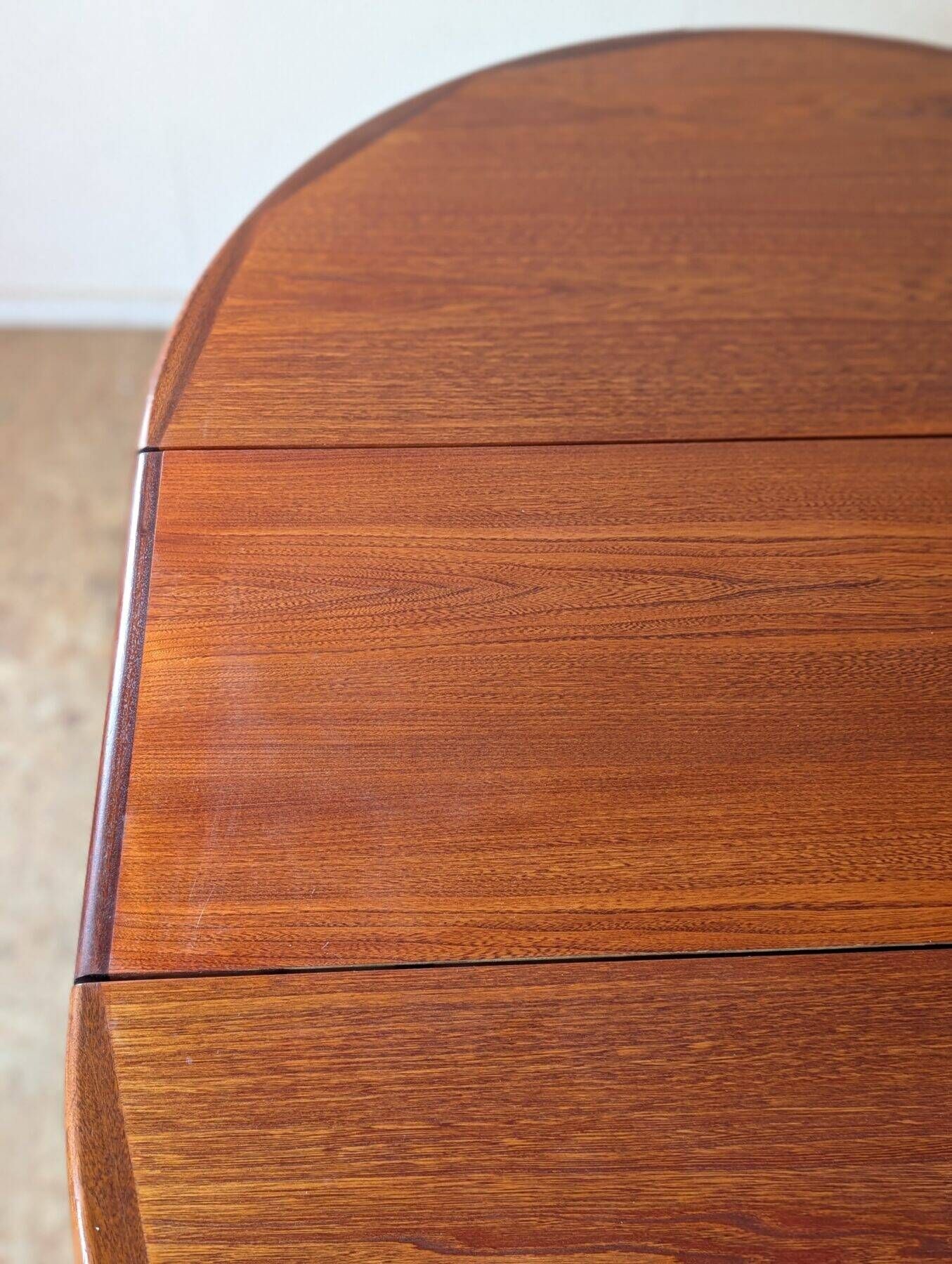 Round teak table with star base, 1960s, extendable.