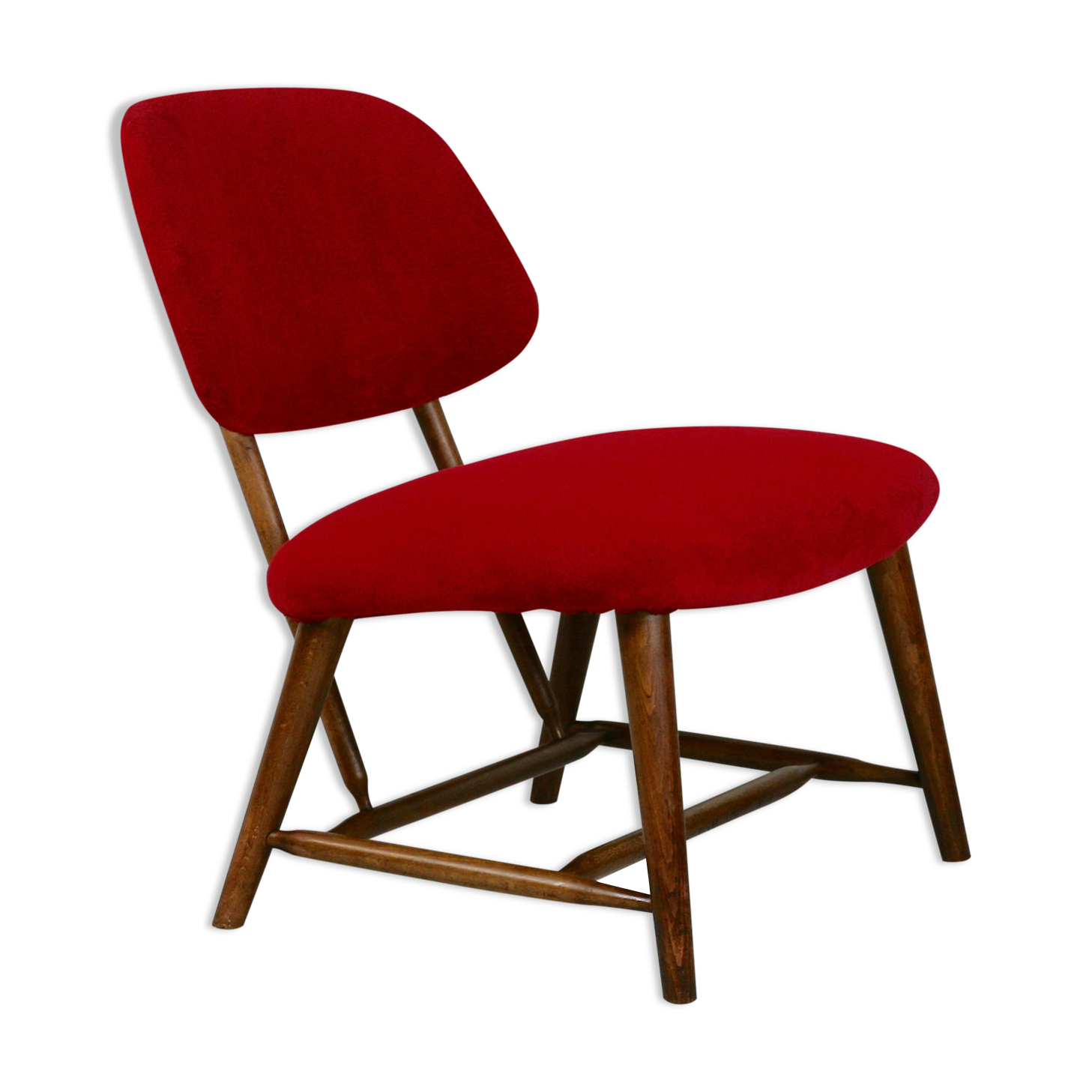 Chauffeuse by Alf Svensson, Model TeVe, published by Ljungs Industrier, Sweden, 1953. Retyped red.