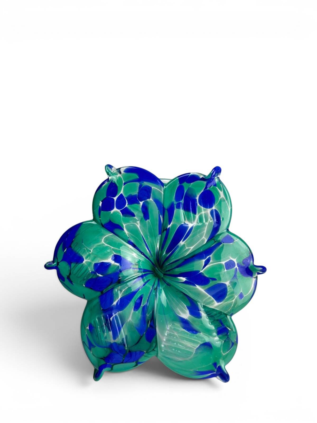 pair of flower candle holders in glass handmade in Italy.