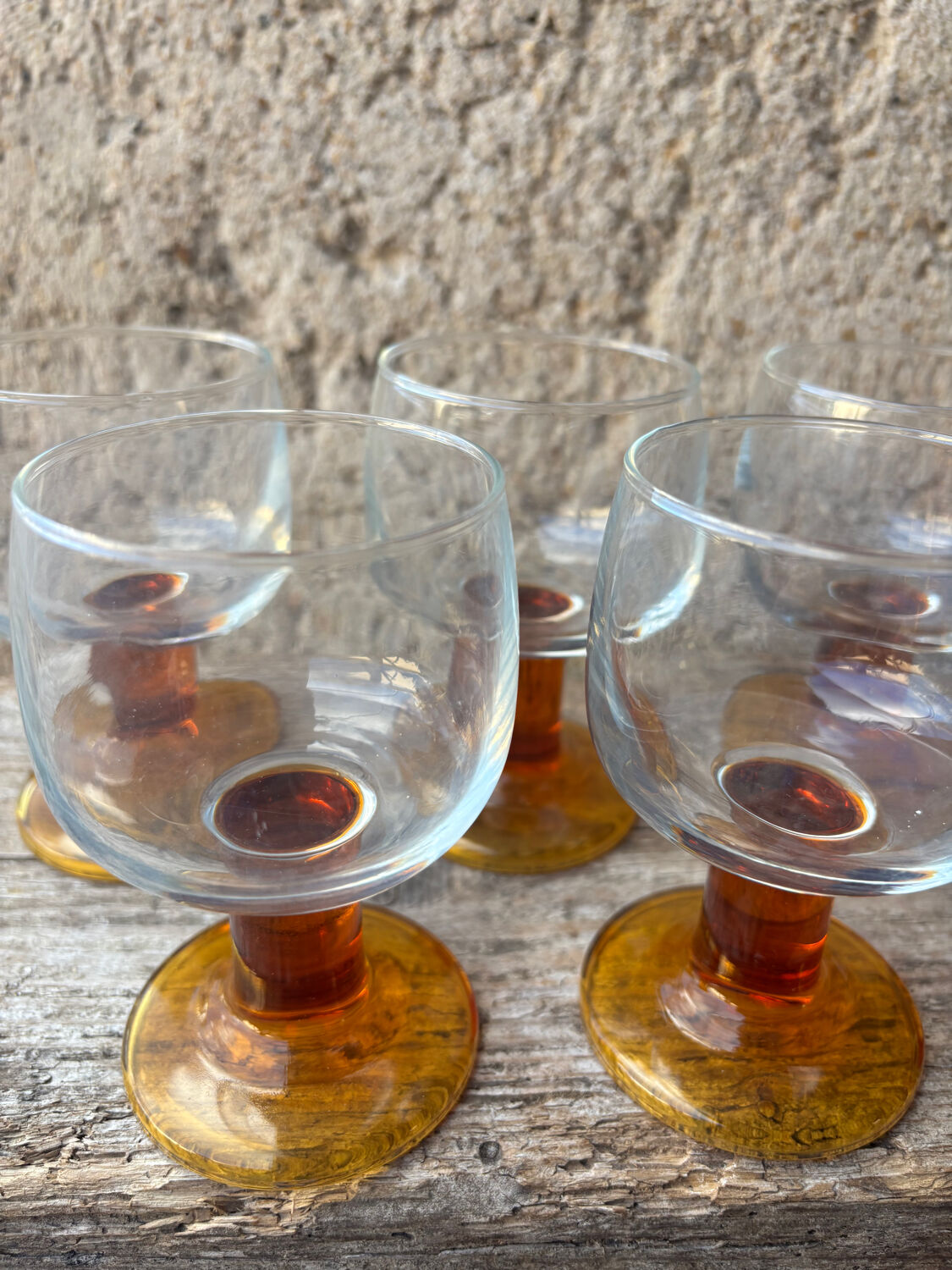 Luminarc footed glasses from the 1970s in orange.