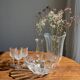 Small vintage Arcoroc Codec glass salad bowl with stylized petal patterns