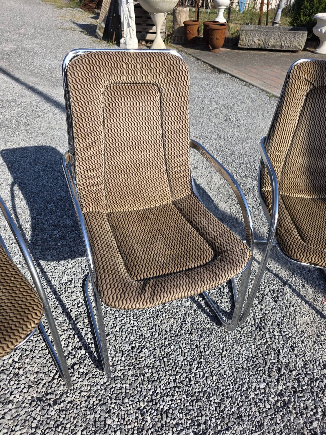 4 chaises Cidue en métal chromé, années 70