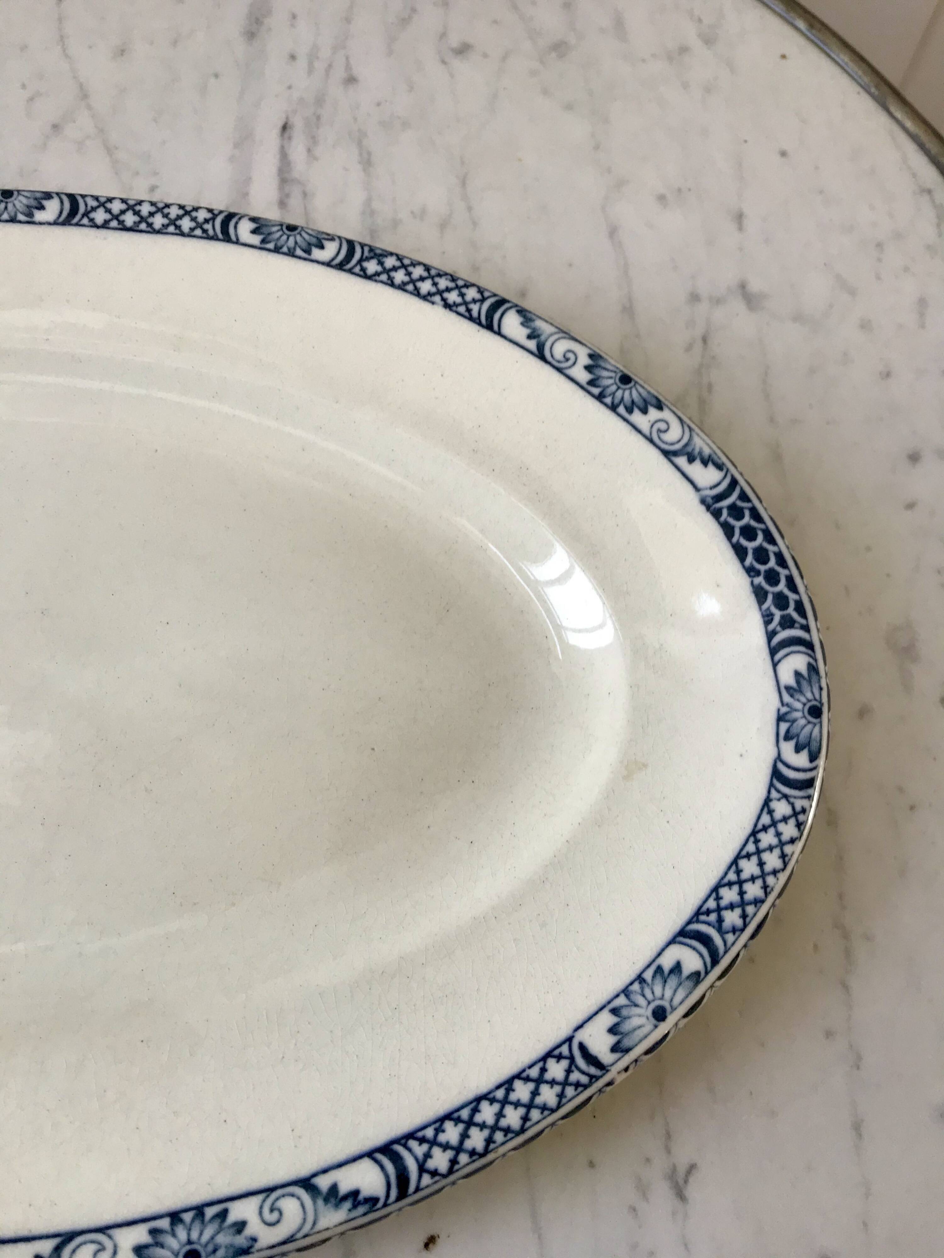 Oval dish in terre de fer bleu xixth