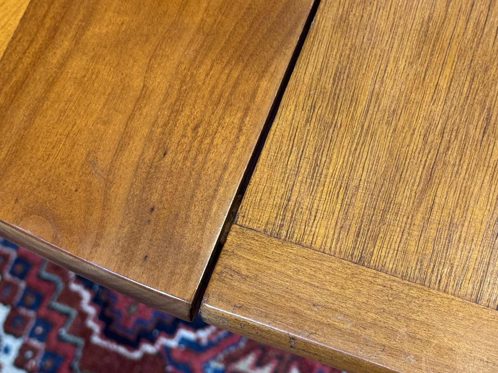 Round cherry wood table, 6 feet, Louis Philippe style with 2 extensions.