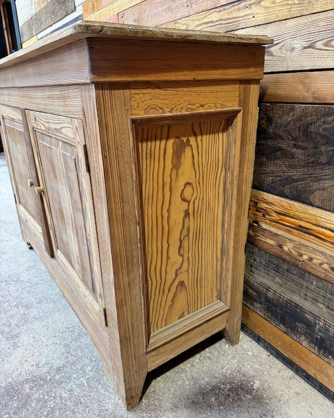 Old low sideboard in solid pitch pine