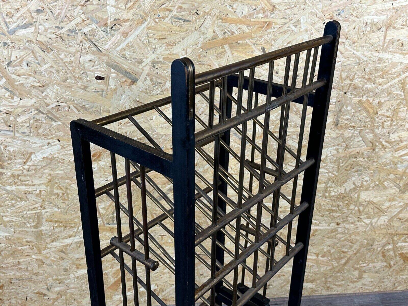 Magazine rack from Wiener Werkstätte Austria made of mahogany & brass around 1900