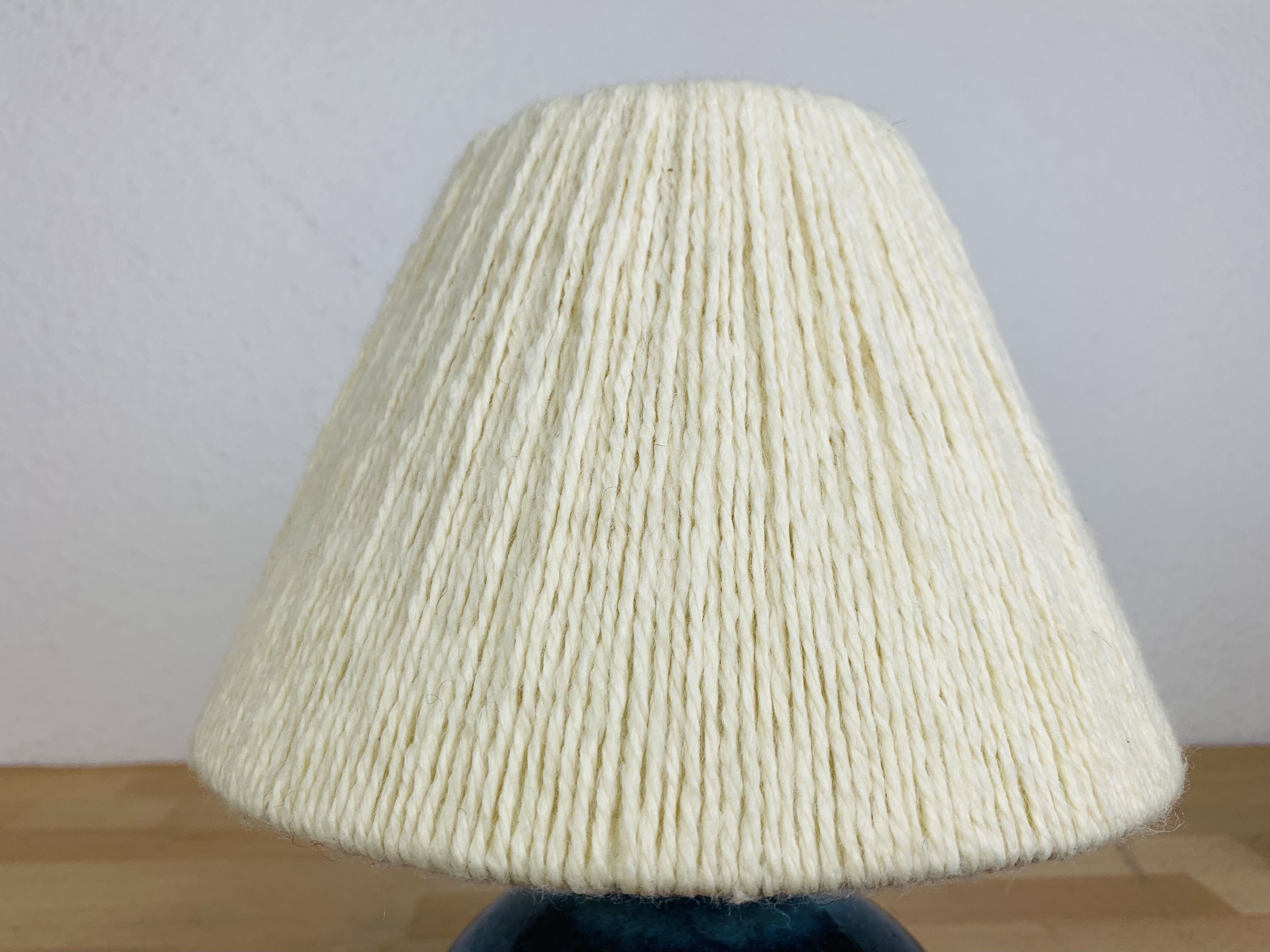Blue ceramic ball lamp by Willy Dougoud