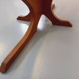 Vintage Hugues Poignant oval coffee table in teak and smoked glass from the 1970s