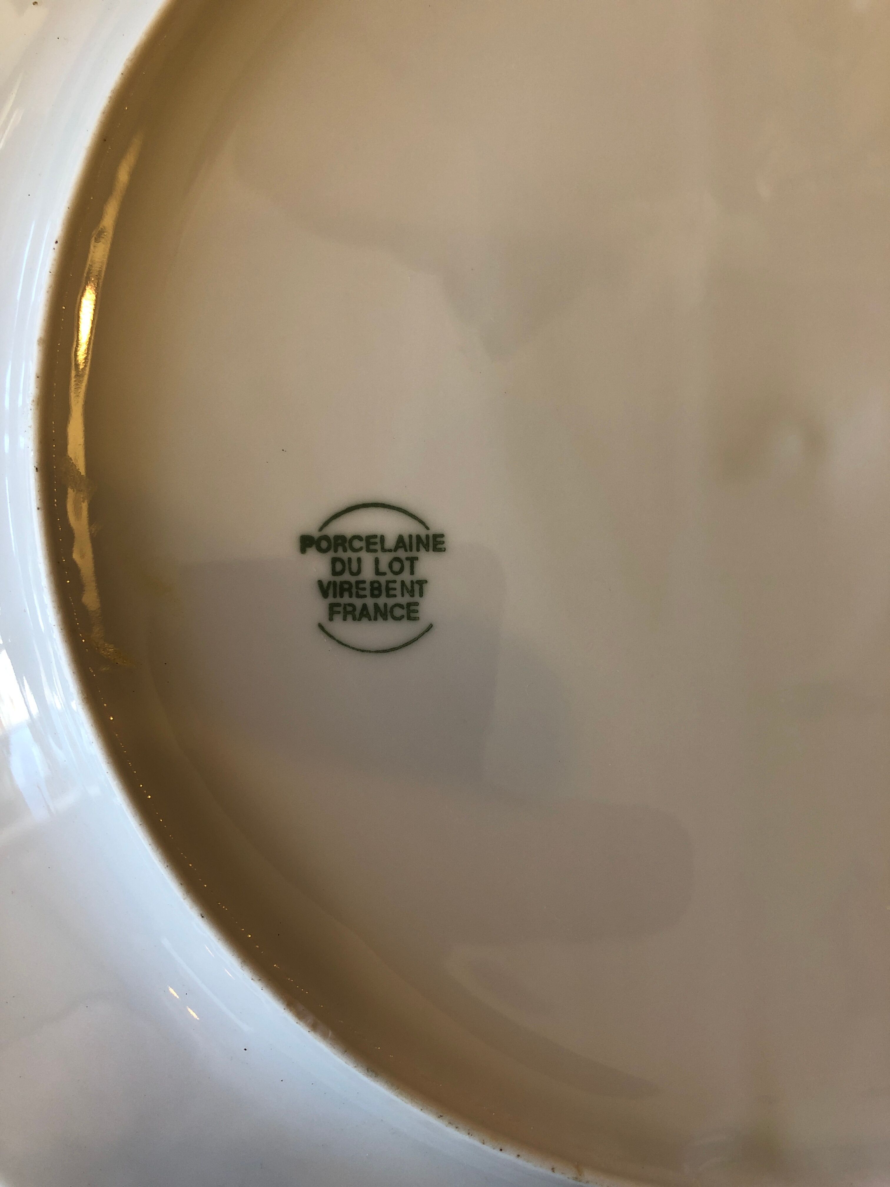 4 white porcelain plates