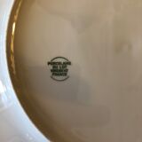4 white porcelain plates