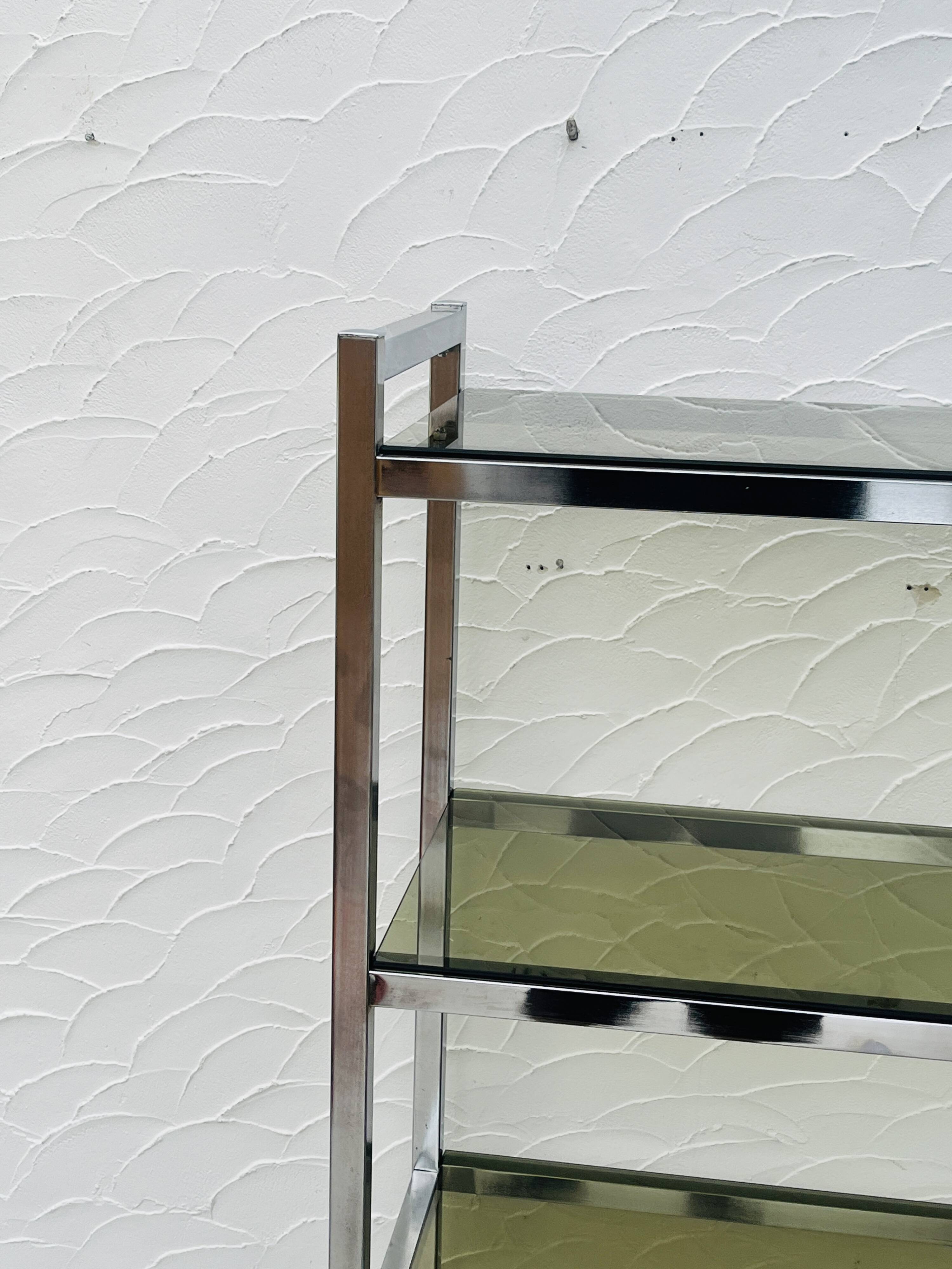 Vintage Italian design shelf in chrome and smoked glass from the 1970s.